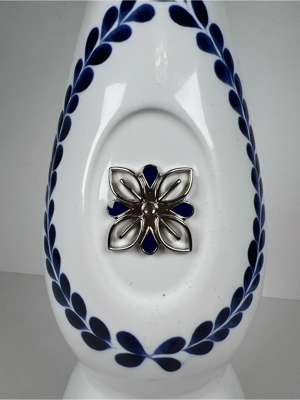 White Ceramic Accent Vase with Blue Floral Motif